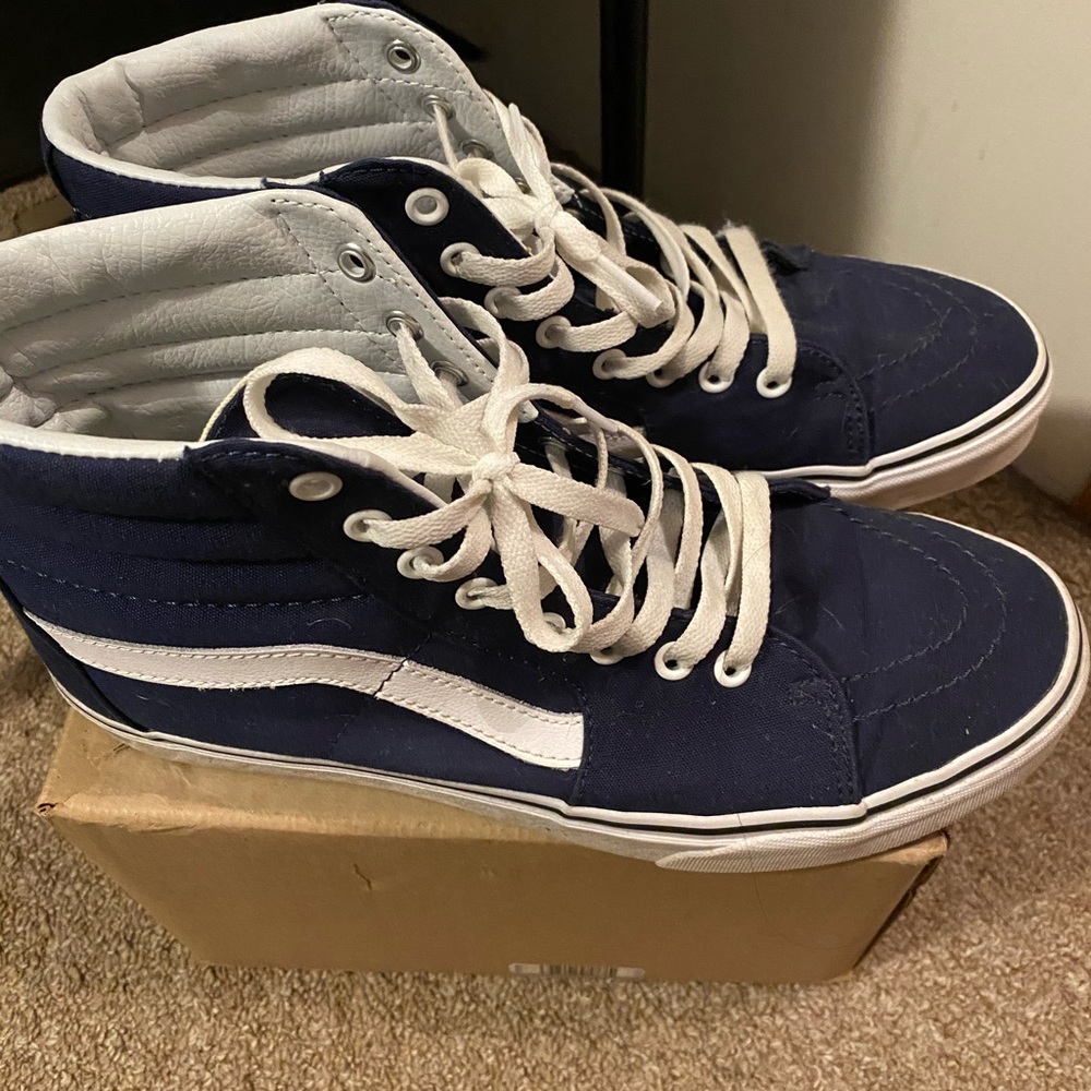 Mid high Navy Blue Vans.